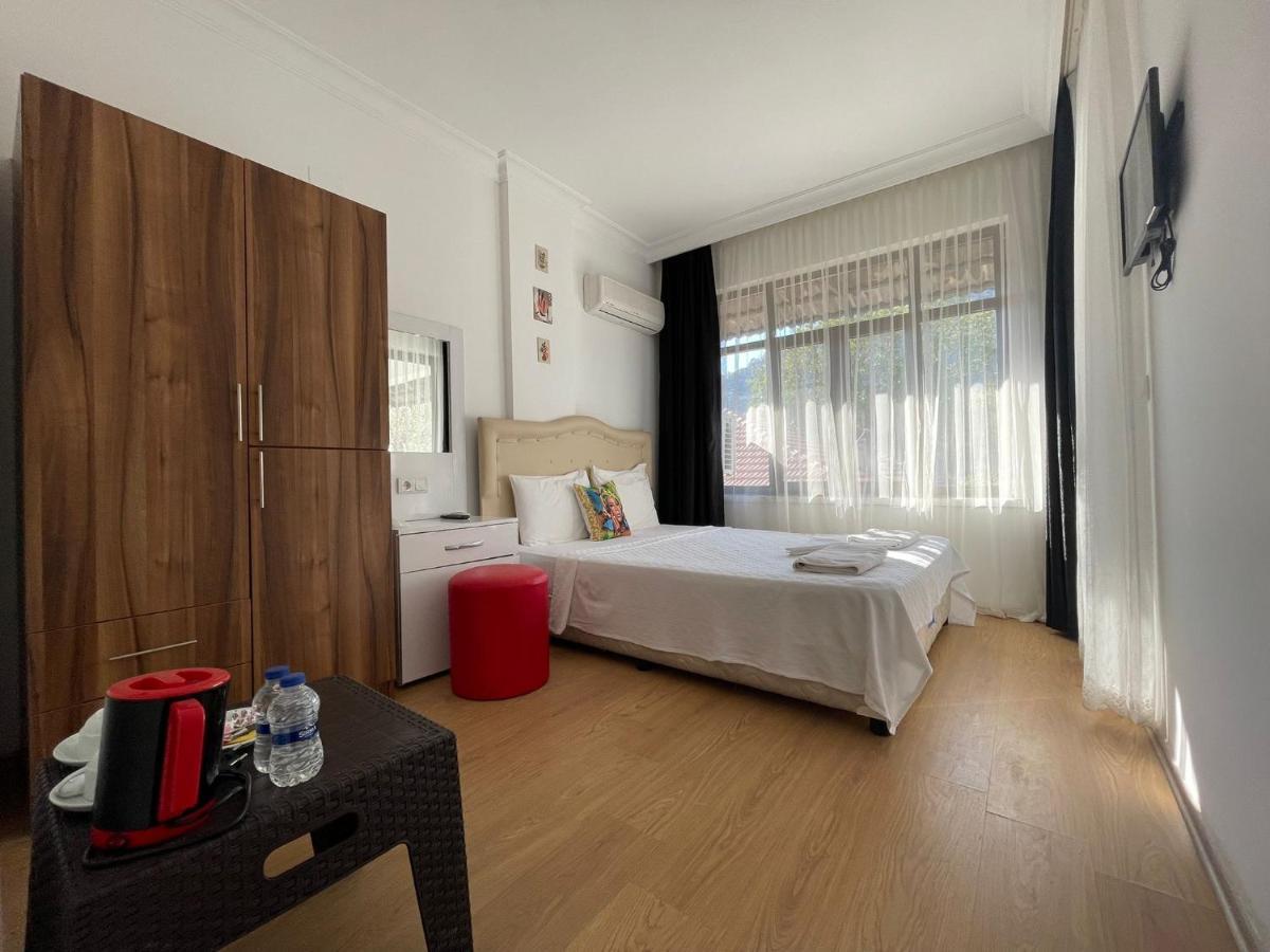 Caunos Antik Hotel Далян Екстериор снимка